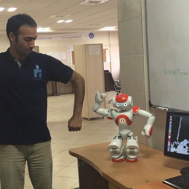 A simple and fast geometric kinematic solution for imitation of human arms by a NAO humanoid robot